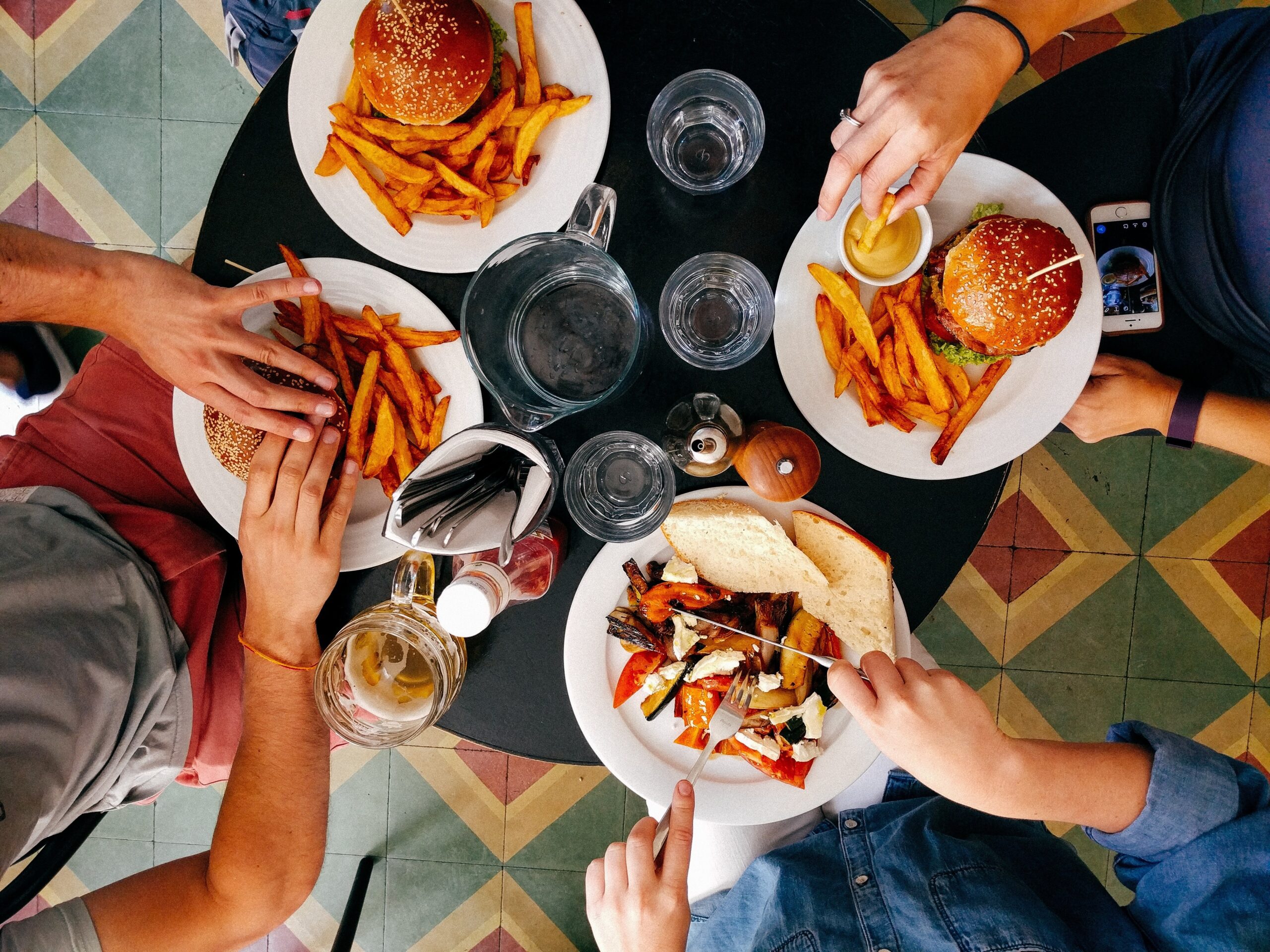 Students enjoying a fresh, customizable meal in a modern campus dining hall